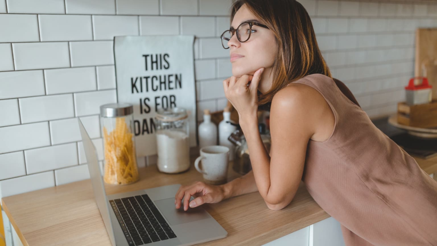 What is the difference between saving and budgeting?