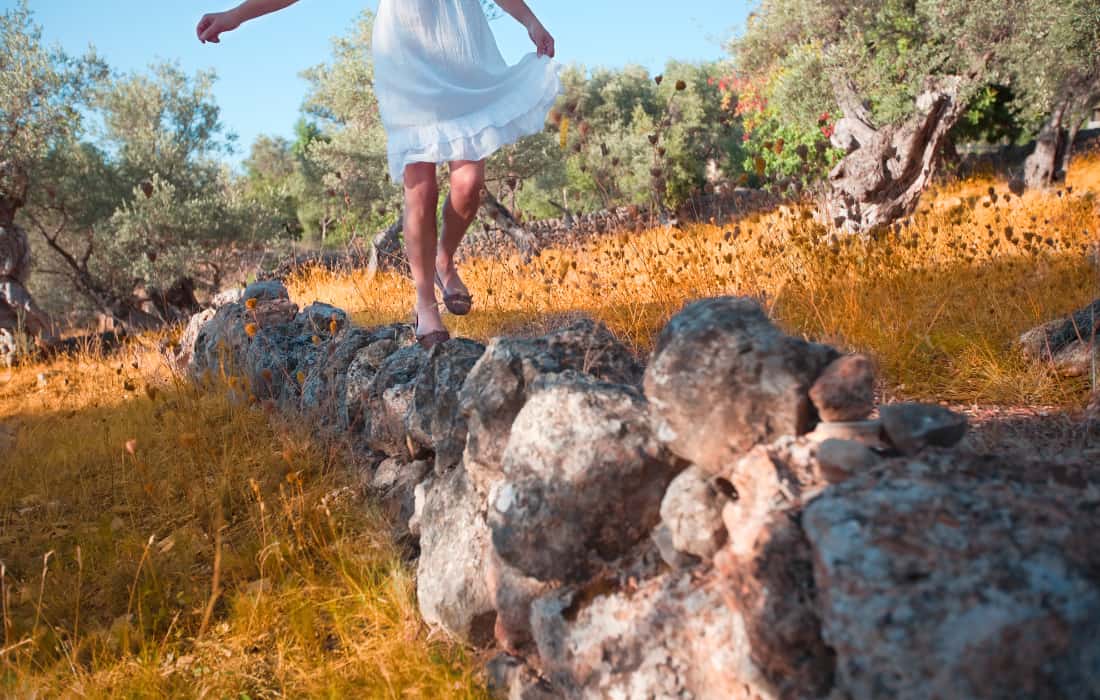 How do I balance taking action and waiting patiently in the manifesting process?