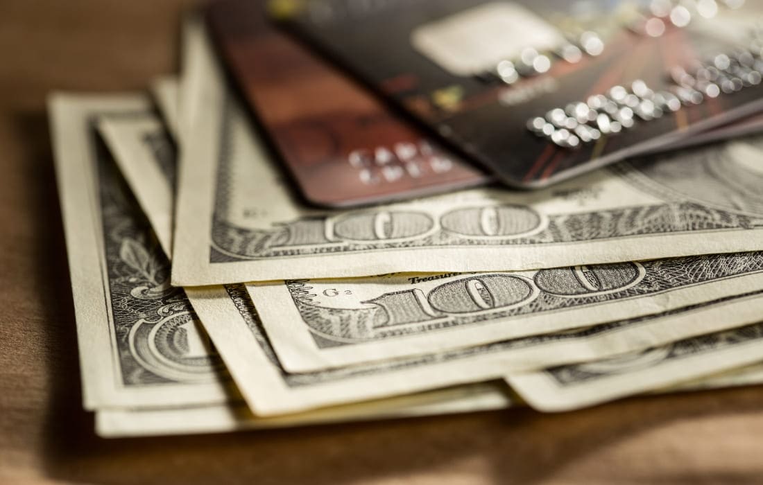 Is it better to use cash or credit cards when trying to budget?